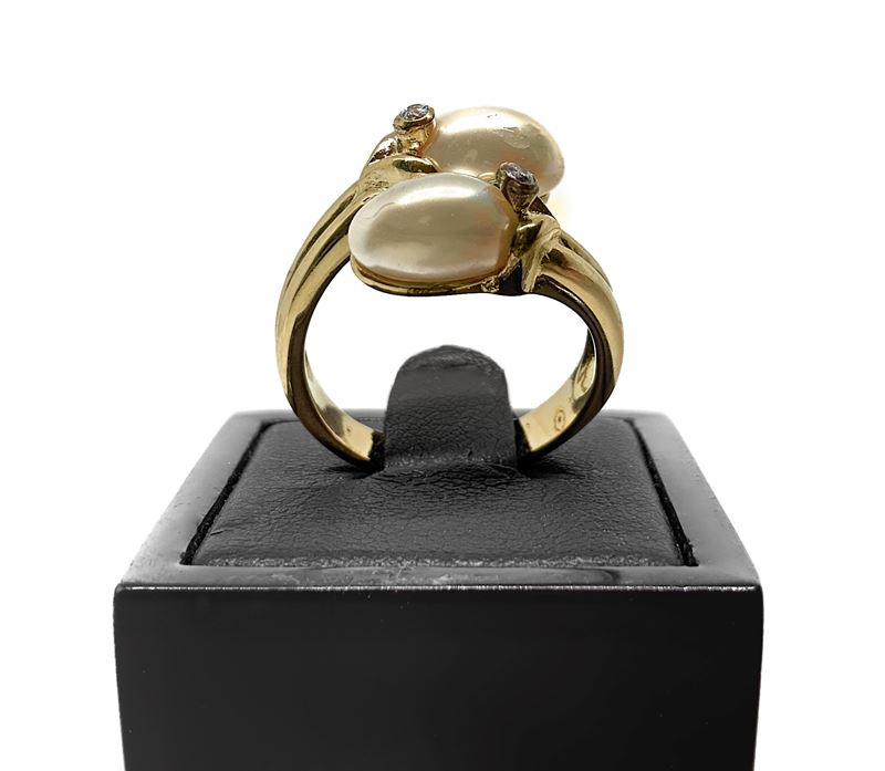 Anello in argento 925 con perle ovali e brillantini