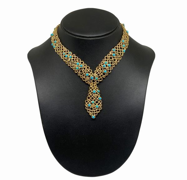 Necklace in gold and turquoise