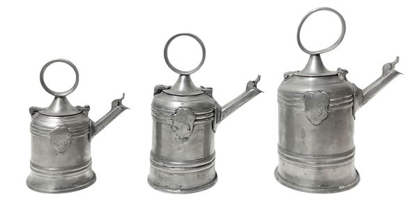 Triptych of antique pourers in solid pewter 95