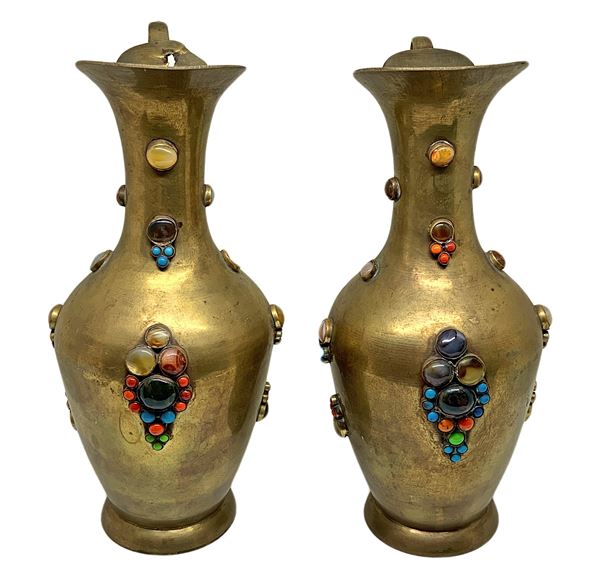 Pair of golden amphorae with precious stones.