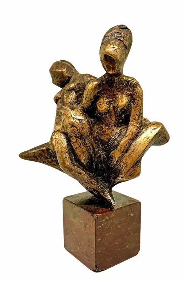  Women, with brown marble base.