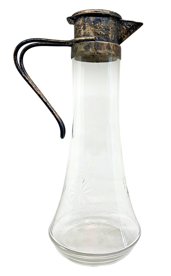 Glass carafe and pewter stopper.