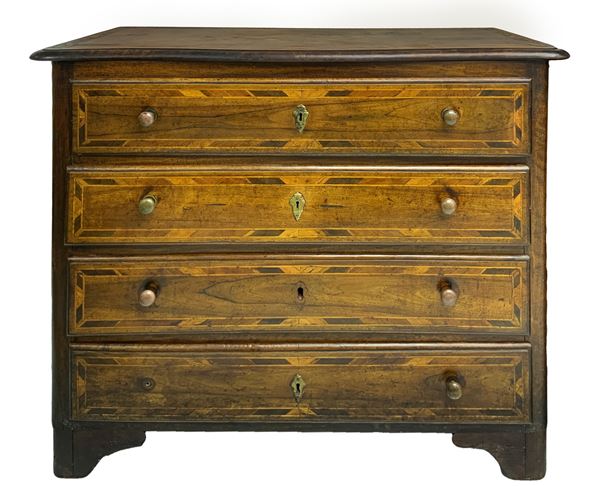Walnut chest of drawers, Emilia, Italy, 18th century.