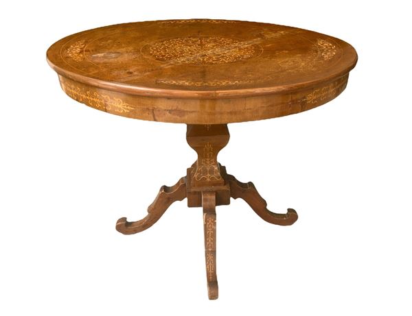 Round table with inlays on the top