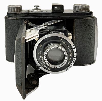 Fotocamera a Soffietto Deckel Monchel, Modello Compur