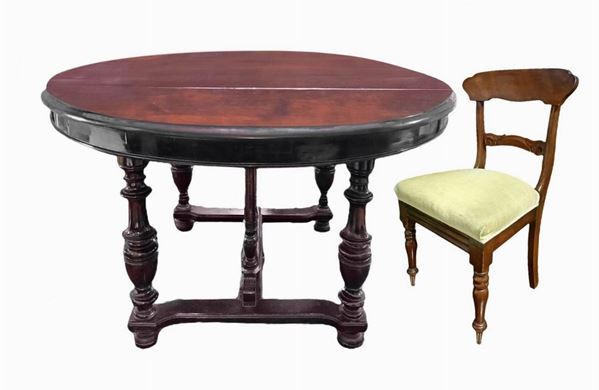 Round mahogany extendable table with four chairs and service extensions