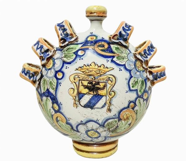 Ceramic jug of Caltagirone signed on the back. Polychrome decoration and coat of arms on the front.