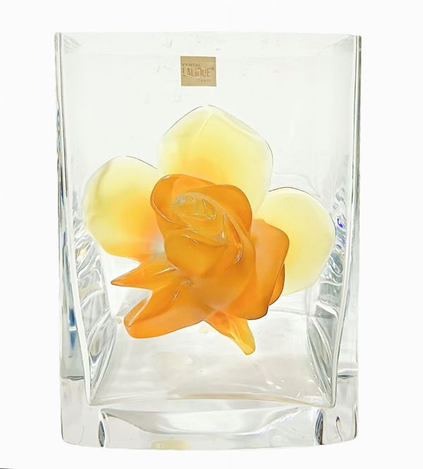 Lalique vase "Amber Rose", transparent glass vase with rose applied on the front in amber color.