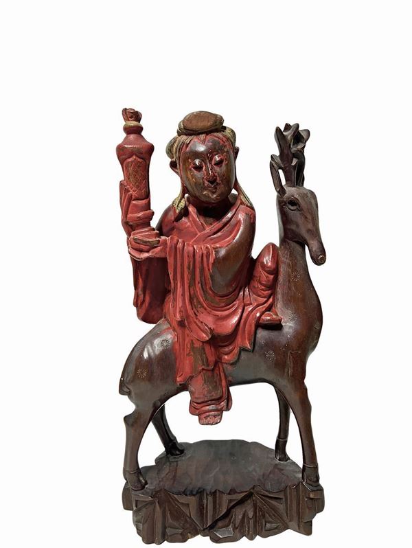 Scultura in legno laccato policromo raffigurante saggio cinese.