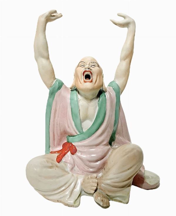 Chinese polychrome porcelain statue.