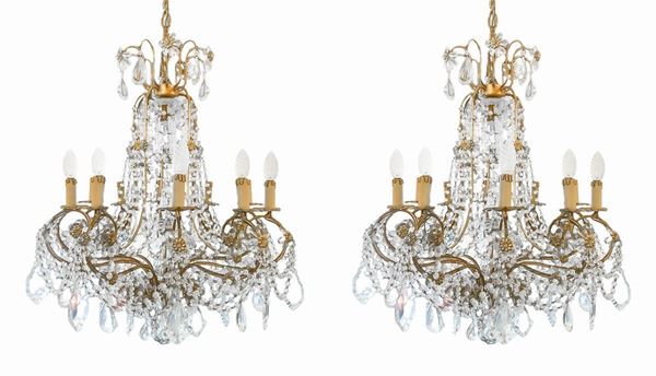 Pair of metal and glass chandeliers
