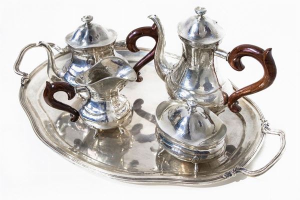 silver from the set consisting of tray, coffee pot, teapot, milk jug and sugar bowl, 20th century. Tray 1,944 Kg. 4 pcs Gross weight 2,112 Kg.
