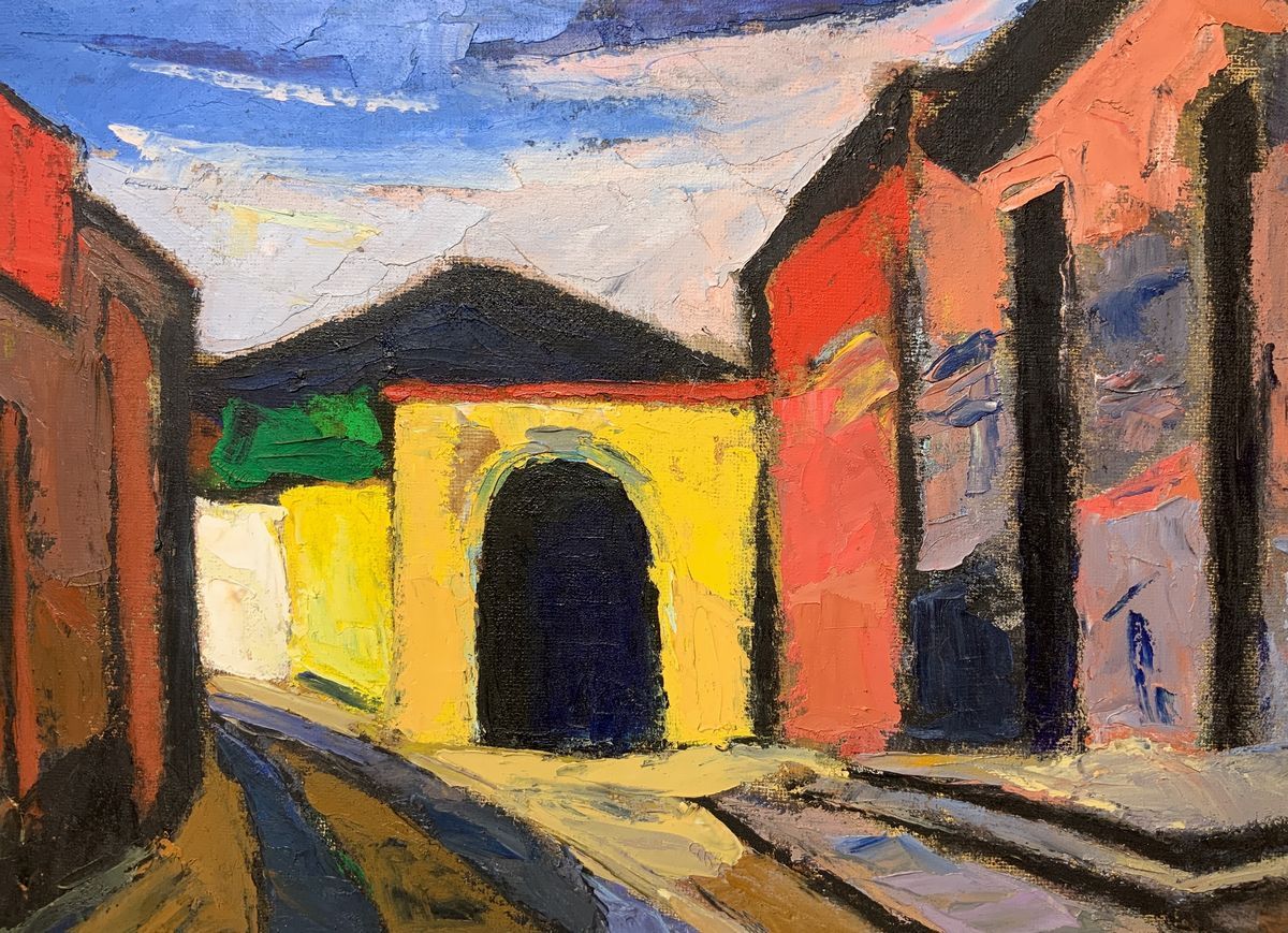 Strada di paese con case (Aci Sant'Antonio) ed Etna in prospettiva.