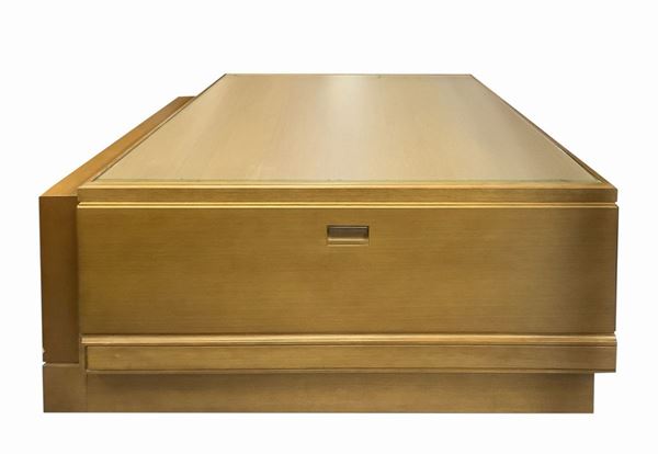 Low table in oak wood.