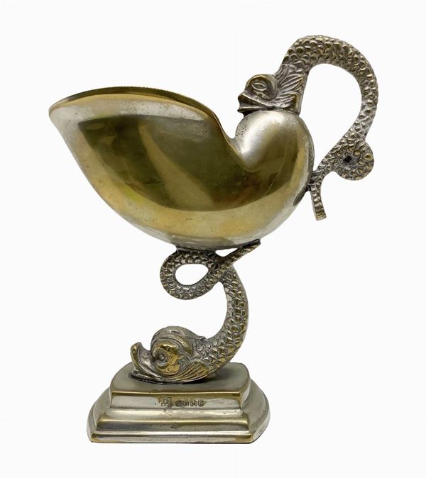 Dolphin with nautilus cup in silver metal