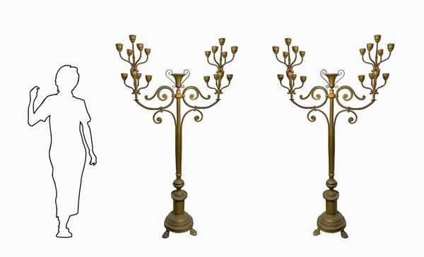 Pair of important candelabra in gilded brass