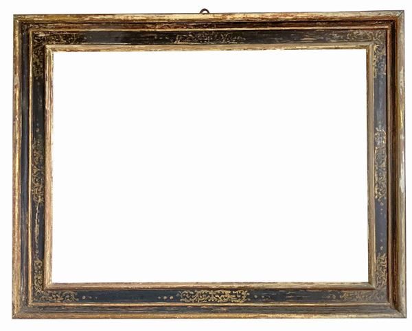 Lacquered and golden wood frame with garlands decorations
