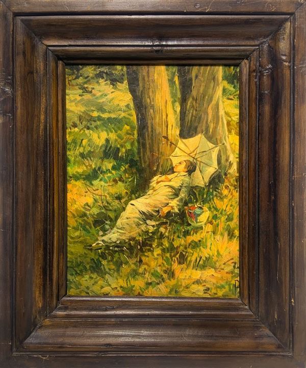 Woman lying under a tree