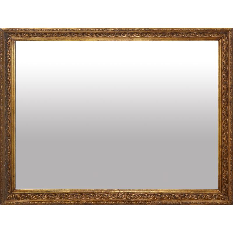 Specchiera a pastiglia in legno dorato, decorata con rilievi floreali