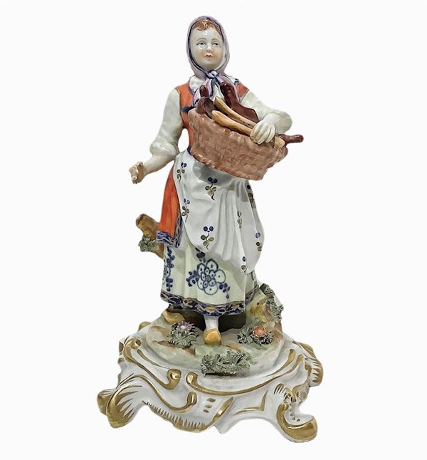 Capodimonte - Capodimonte statue depicting woman selling spoons.