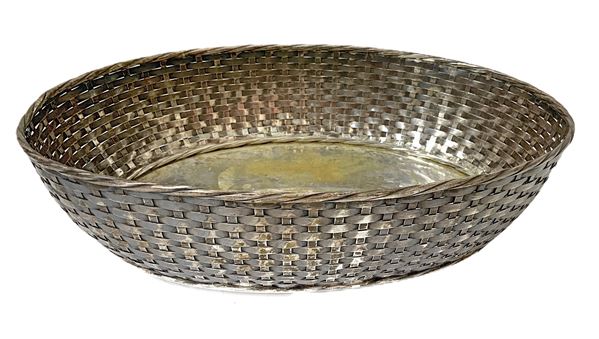Oval silver centerpiece, with a braided basket