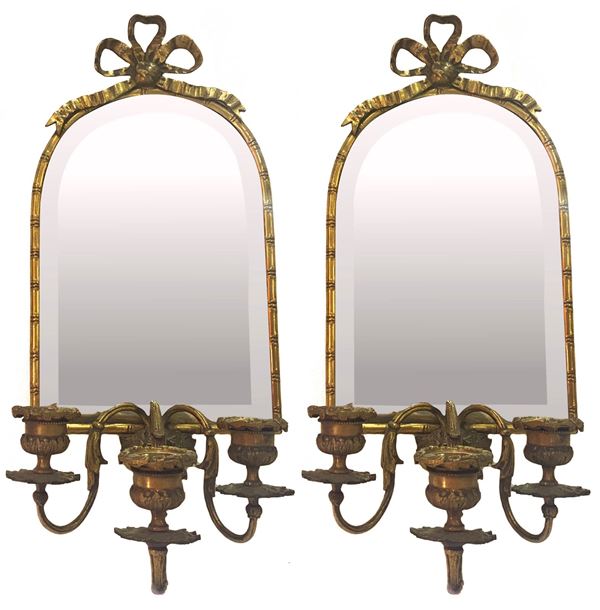 Pair of mirrors with candle holders