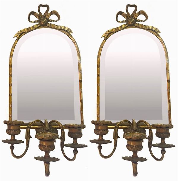 Pair of mirrors with candle holders