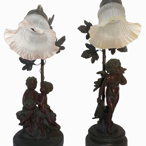 Pair of lamps with cherubs