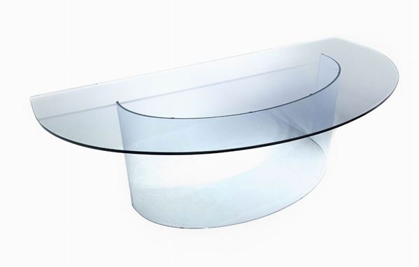 Fiam, desk in glass with plane demilune, foot formed by a curved glass plate thick. 80s. H cm 72x230x112.