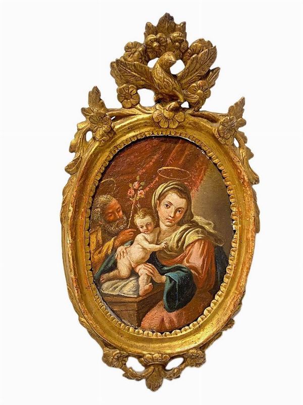 Dipinto ad olio su tela ovale raffigurante Sacra Famiglia, attribuibile a Vito D’Anna (Palermo, 1718 – Palermo, 1769). Preziosa cornice in legno scolpito dorato. . Cm 23x18. In cornice cm 43x 23
