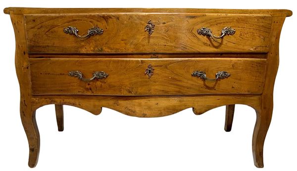Chest of drawers with two drawers in solid walnut, moved on the front with shaped under-drawer apron and cabriole feet.