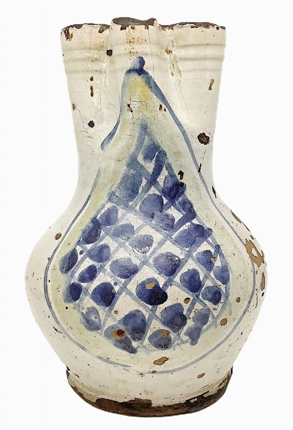 Mug, Caltagirone, Sicily, seventeenth century, white and blue medallion front. Bibliography "Terracotta", Antonino Aragon, pg 110 n.63. H 20 cm
