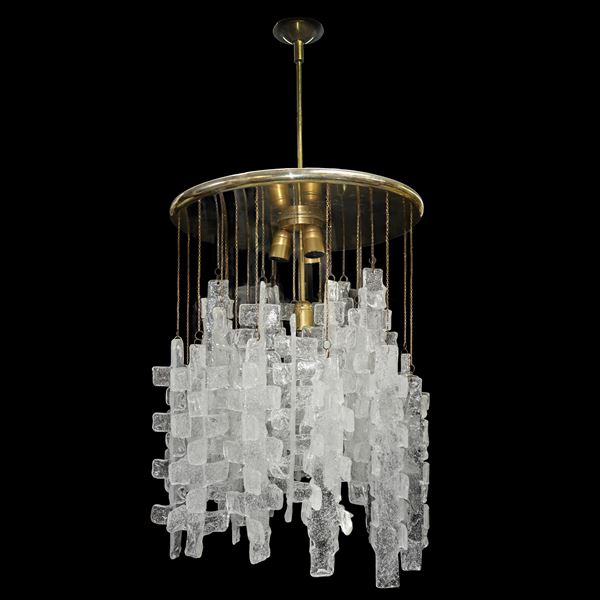 Glass chandelier, Murano, in the style of A.D.Mazzega, 1970s. With elements in pulegative glass of geometric shape, structure in polished brass. ...