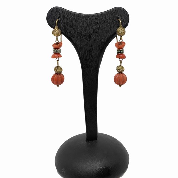 Gold and coral pendant earrings