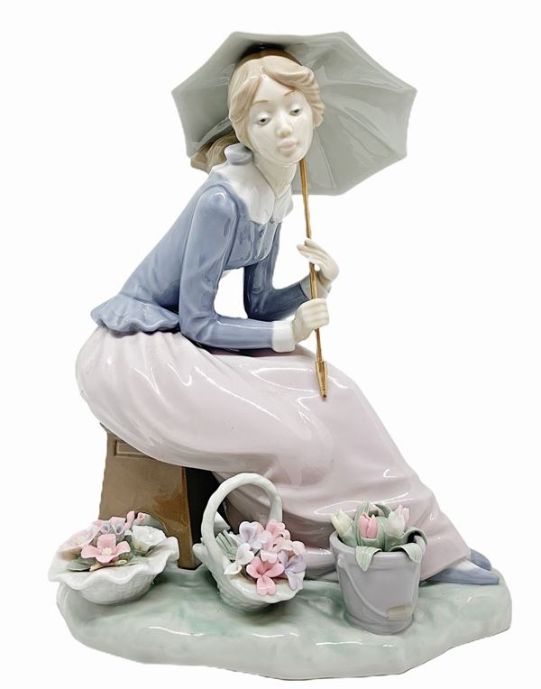 Nao by Llandr&#242; - Little woman with umbrella, hat and flower baskets