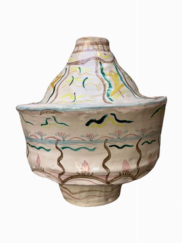 Terracotta majolica vase with an informal taste
