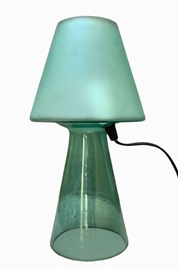 Table lamp in monolithic glass in shades of green, satin upper part.
