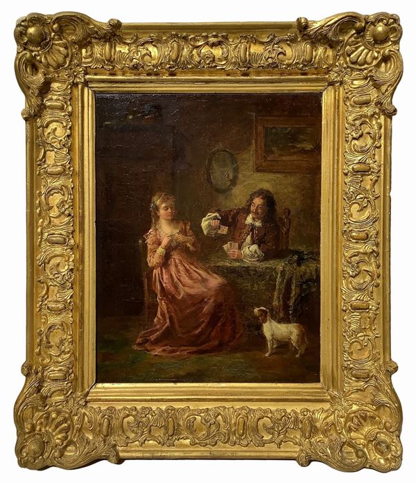 Couple playing cards with dog