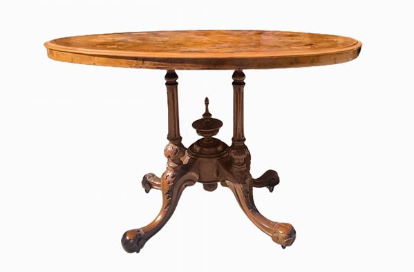 Oval table in briar of walnut and walnut