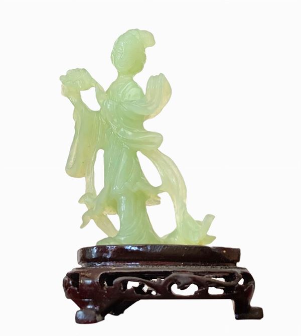 Guanyn in green jade