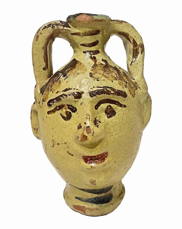 Small jar of Caltagirone of anthropomorphic figure