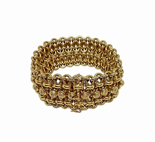 Importante bracciale in oro giallo a fascia