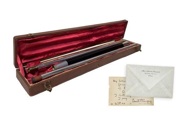 Billiard cue, in original box with 'Ernest Hemingway' plate