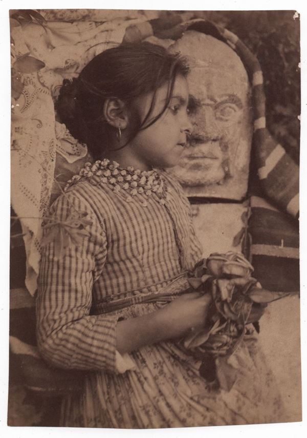 Wilhelm Von Gloeden - Girl near stone sculpture