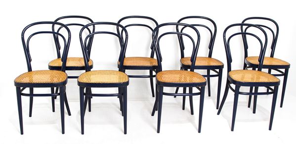 Thonet - 8 chairs, model214, manufacturing label. In steamed beech and vienna straw sitting, dark blue color.H 84x36x41 cm
