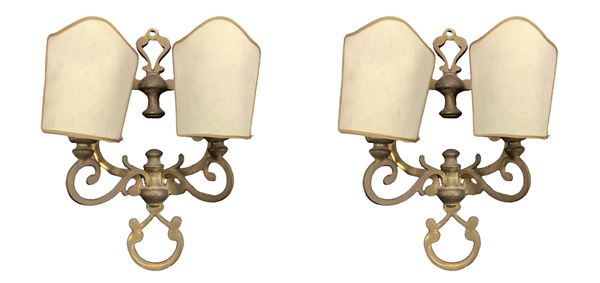 Pair of two-light golden metal wall lamps