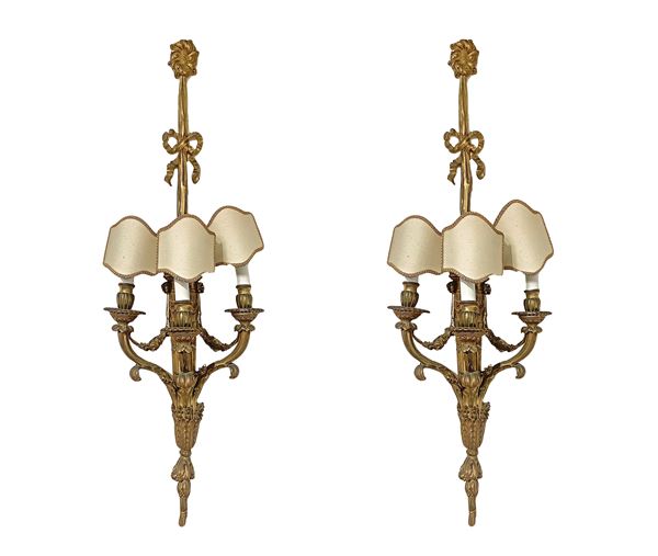 Pair of three-light gilded bronze wall lamps