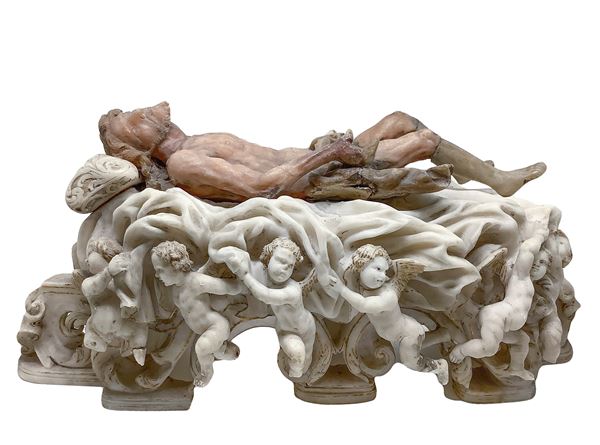Christ on an embossed bed with cherubs