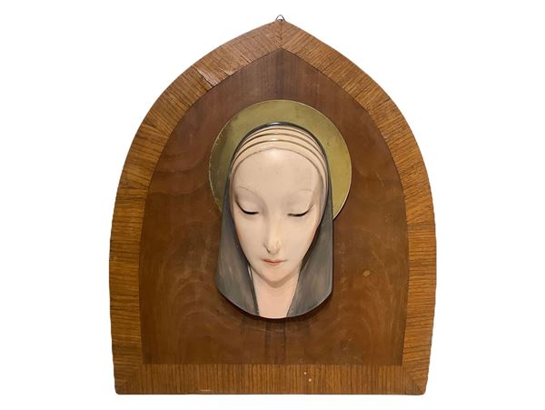 G. Launeck - Capezzale con volto di Madonna in gesso policromo