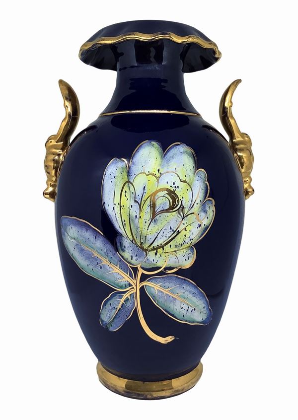 Vase with blue background with gold details